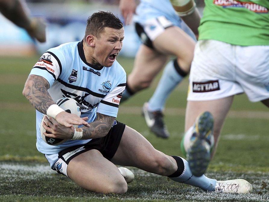 Todd Carney of the Sharks goes down in pain during the Second NRL Elimination Final match between the Canberra Raiders and the Cronulla Sharks at Canberra Stadium on September 9, 2012 in Canberra, Australia. Todd Carney of the Sharks goes down in pain during the Second NRL Elimination Final match between the Canberra Raiders and the Cronulla Sharks at Canberra Stadium on September 9, 2012 in Canberra, Australia.