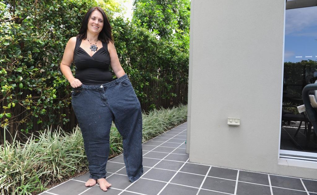Kellie Scarponi after her weight loss. She can now fit into one leg of her old jeans. Kellie Scarponi after her weight loss. She can now fit into one leg of her old jeans.