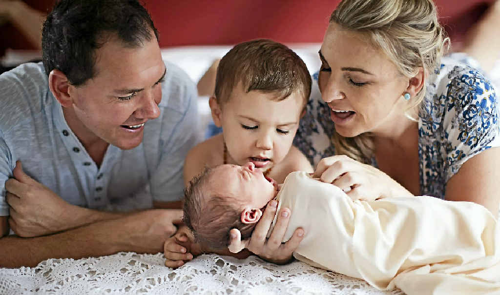 WATER BABY: Guinevere Portia Rapley with mum and dad Rachel and Grant plus big brother Jedd. WATER BABY: Guinevere Portia Rapley with mum and dad Rachel and Grant plus big brother Jedd.