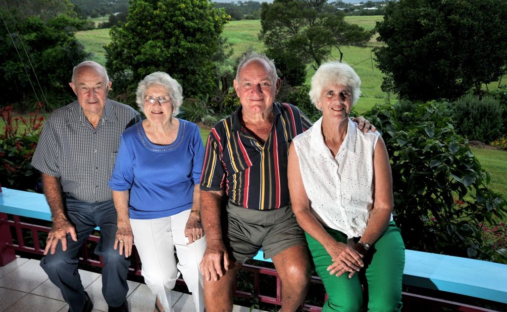 Long-term local residents (left) Neil and Betty Garrett and Ron and Florence Taylor at the Taylors’ property overlooking cane fields on Petrie Creek Rd, Rosemount. Long-term local residents (left) Neil and Betty Garrett and Ron and Florence Taylor at the Taylors’ property overlooking cane fields on Petrie Creek Rd, Rosemount.