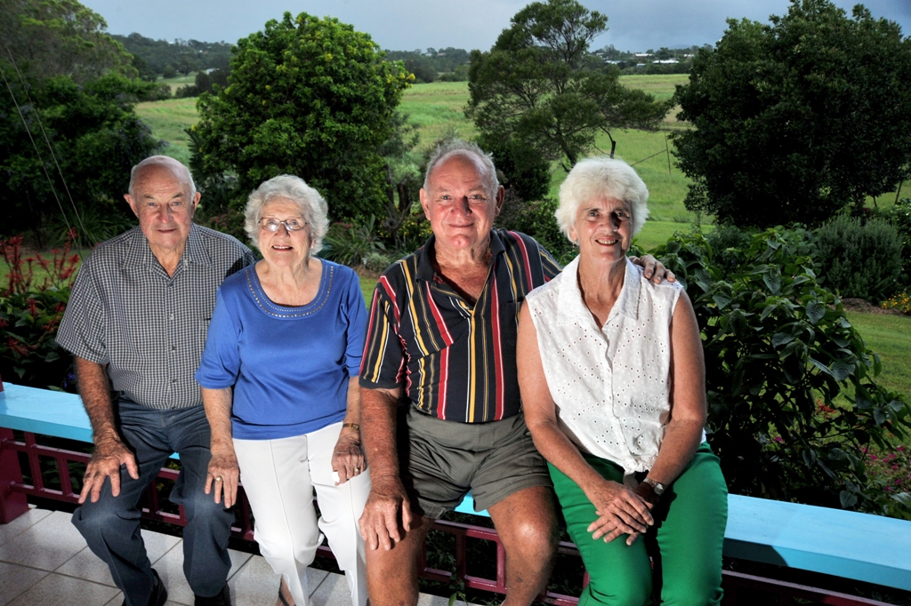 Long-term local residents (left) Neil and Betty Garrett and Ron and Florence Taylor at the Taylors’ property overlooking cane fields on Petrie Creek Rd, Rosemount. Long-term local residents (left) Neil and Betty Garrett and Ron and Florence Taylor at the Taylors’ property overlooking cane fields on Petrie Creek Rd, Rosemount.