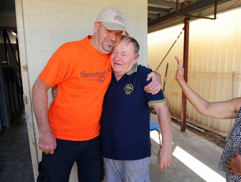 Samaritan’s Purse Disaster Relief Deployment co-ordinator Russell Wright is given an appreciative hug by home owner Emil Barkovic. Samaritan’s Purse Disaster Relief Deployment co-ordinator Russell Wright is given an appreciative hug by home owner Emil Barkovic.