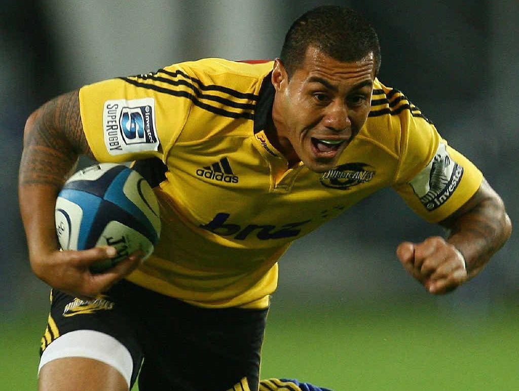 IN SIGHT: Tusi Pisi, of the Hurricanes, gets tackled last night in Dunedin. IN SIGHT: Tusi Pisi, of the Hurricanes, gets tackled last night in Dunedin.