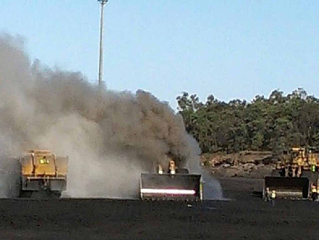 Smoke pours from heavy machinery at Saraji Mine. Smoke pours from heavy machinery at Saraji Mine.