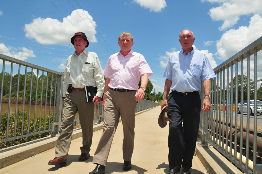 Former Minister for regional Australia Simon Crean, pictured with Nationals Party leader Warren Truss and former Fraser Coast mayor Mick Kruger, has been sacked from his ministerial position after a bizarre day in Australian politics.