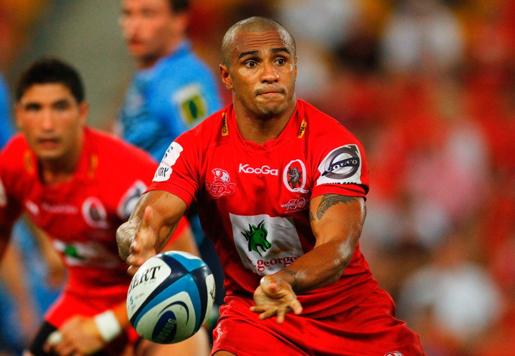Will Genia of the Reds passes the ball during the round 6 Super Rugby match between the Reds and the Bulls at Suncorp Stadium on March 23, 2013 in Brisbane, Australia. Will Genia of the Reds passes the ball during the round 6 Super Rugby match between the Reds and the Bulls at Suncorp Stadium on March 23, 2013 in Brisbane, Australia.