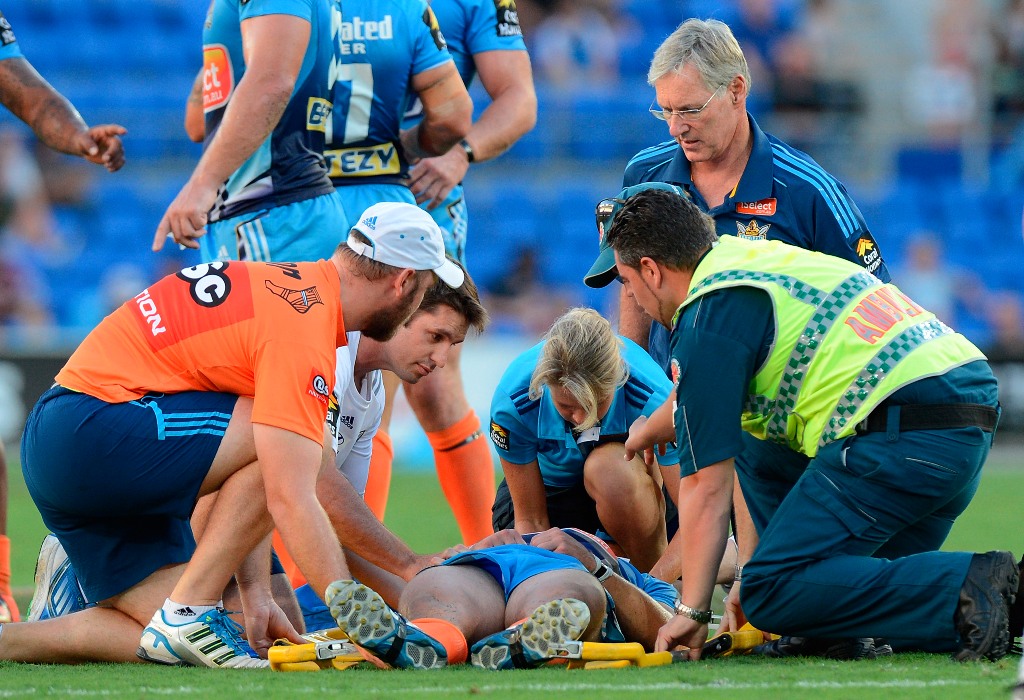 Ashley Harrison of the Titans is knocked out after being hit late by Richie Fa'Aoso of the Sea Eagles during the round three NRL match between the Gold Coast Titans and the Manly Sea Eagles at Skilled Park on March 23, 2013 in Gold Coast, Australia. Ashley Harrison of the Titans is knocked out after being hit late by Richie Fa'Aoso of the Sea Eagles during the round three NRL match between the Gold Coast Titans and the Manly Sea Eagles at Skilled Park on March 23, 2013 in Gold Coast, Australia.