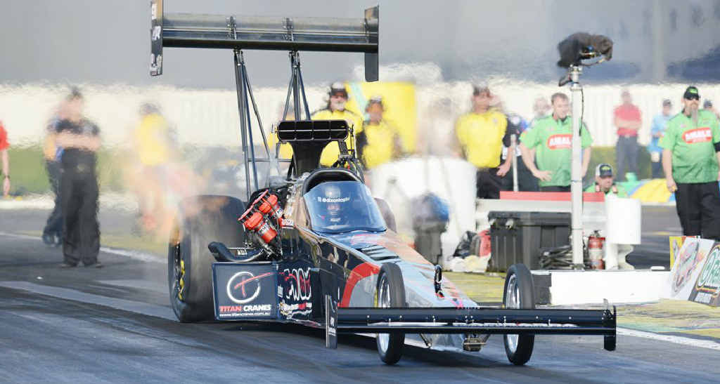 FIRED UP: American racer Larry Dixon is ready to crank up his Rapisarda team machine at Willowbank Raceway. FIRED UP: American racer Larry Dixon is ready to crank up his Rapisarda team machine at Willowbank Raceway.