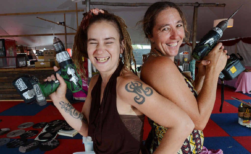 GOT THE DRILL?: Decor designer Emma Woodburn and Christina Covinton from Hari Har Chai spruce up the Cavanbah food hall at Bluesfest. GOT THE DRILL?: Decor designer Emma Woodburn and Christina Covinton from Hari Har Chai spruce up the Cavanbah food hall at Bluesfest.
