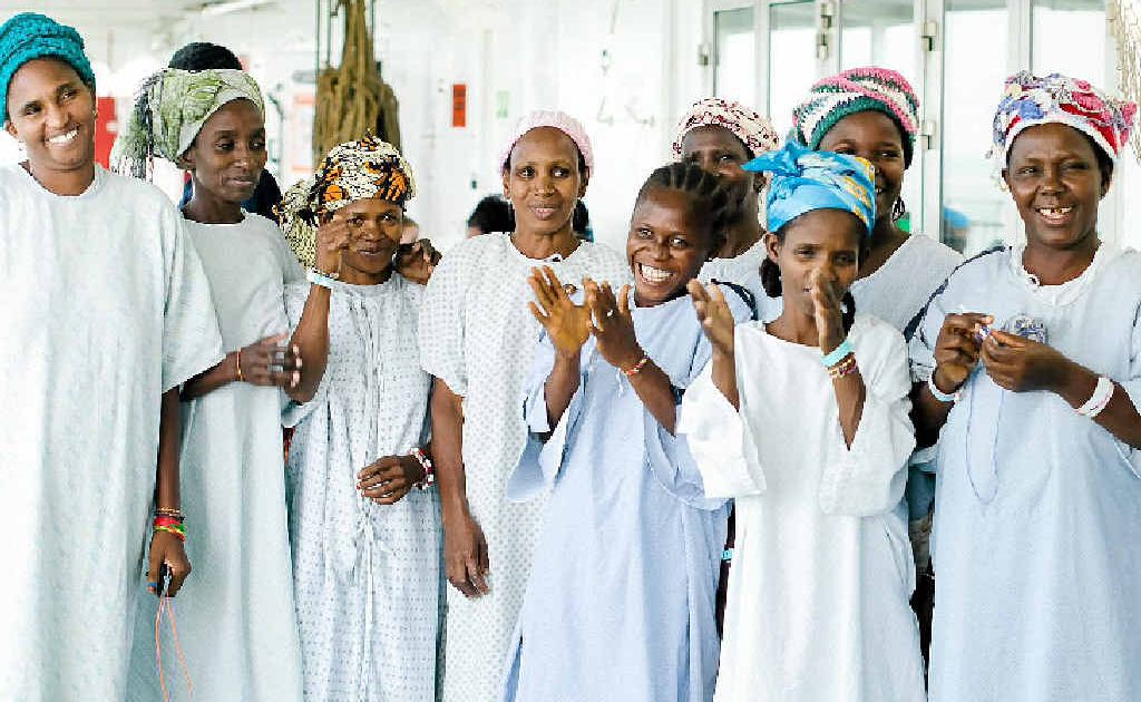 Fistula patients celebrate following successful surgery on board the Africa Mercy in Guinea. Fistula patients celebrate following successful surgery on board the Africa Mercy in Guinea.