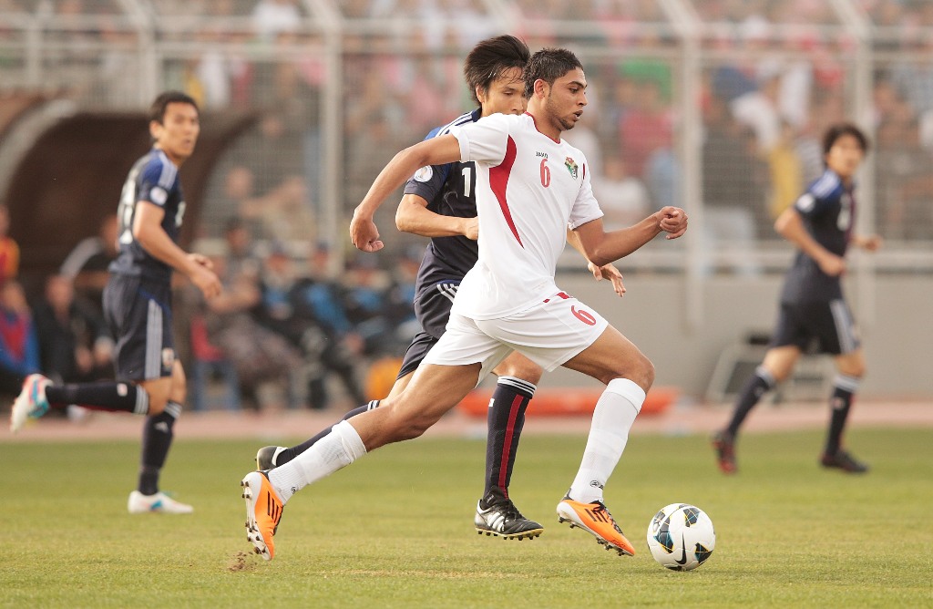 Saeed Al Murjan of Jordan in action during the FIFA World Cup Asian qualifier match between Jordan and Japan at King Abdullah International Stadium on March 26, 2013 in Amman, Jordan. Saeed Al Murjan of Jordan in action during the FIFA World Cup Asian qualifier match between Jordan and Japan at King Abdullah International Stadium on March 26, 2013 in Amman, Jordan.