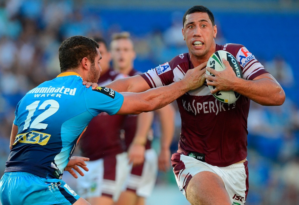 Brent Kite of the Sea Eagles pushes away from the defence during the round three NRL match between the Gold Coast Titans and the Manly Sea Eagles at Skilled Park on March 23, 2013 in Gold Coast, Australia. Brent Kite of the Sea Eagles pushes away from the defence during the round three NRL match between the Gold Coast Titans and the Manly Sea Eagles at Skilled Park on March 23, 2013 in Gold Coast, Australia.