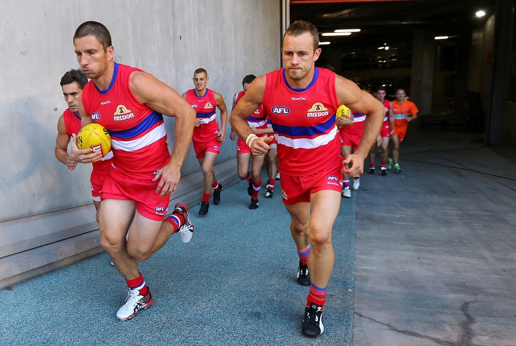 Matthew Boyd (L) and Daniel Cross lead the Western Bulldogs out during the round two NAB Cup AFL match between the Western Bulldogs and the Hawthorn Hawks at Etihad Stadium on March 1, 2013 in Melbourne, Australia. Matthew Boyd (L) and Daniel Cross lead the Western Bulldogs out during the round two NAB Cup AFL match between the Western Bulldogs and the Hawthorn Hawks at Etihad Stadium on March 1, 2013 in Melbourne, Australia.