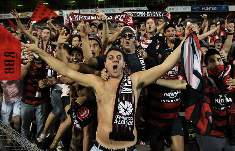 Wanderers fans celebrate after defeating the Jets during the round 27 A-League match between the Newcastle Jets and Western Sydney at Hunter Stadium. Wanderers fans celebrate after defeating the Jets during the round 27 A-League match between the Newcastle Jets and Western Sydney at Hunter Stadium.