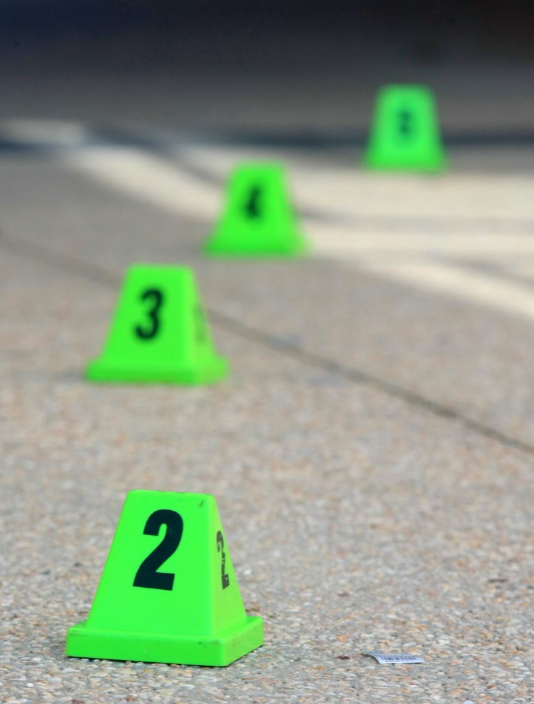 Evidence markers on road at the crime scene in Robina killing. Photo: John Gass / Tweed Daily News TWE170511crime Evidence markers on road at the crime scene in Robina killing. Photo: John Gass / Tweed Daily News TWE170511crime
