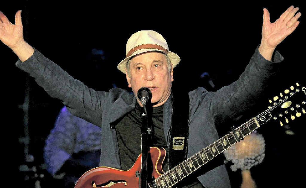 ABOVE: American songwriter and producer Paul Simon performs during the Timbre Rock and Roots concert on Friday March 22, 2013 in Singapore. ABOVE: American songwriter and producer Paul Simon performs during the Timbre Rock and Roots concert on Friday March 22, 2013 in Singapore.