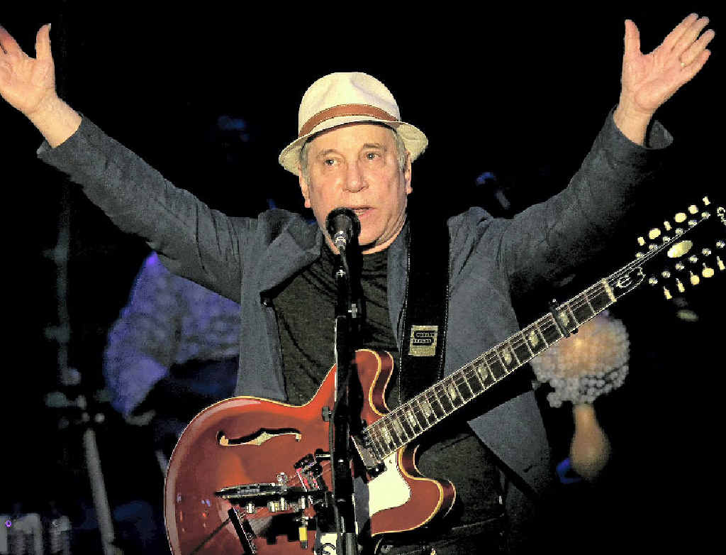 ABOVE: American songwriter and producer Paul Simon performs during the Timbre Rock and Roots concert on Friday March 22, 2013 in Singapore. ABOVE: American songwriter and producer Paul Simon performs during the Timbre Rock and Roots concert on Friday March 22, 2013 in Singapore.
