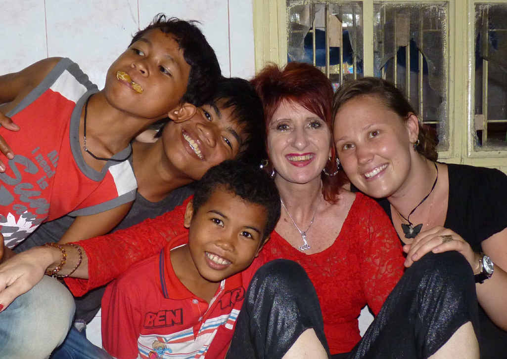 IN HIDING: Tracey Golder with some of the Love in Action kids in Cambodia. IN HIDING: Tracey Golder with some of the Love in Action kids in Cambodia.