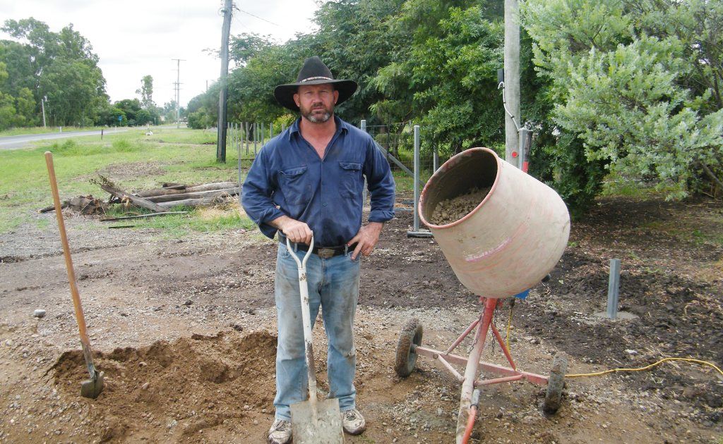 John McAlister fixing his Jambin property after the Australia Day floods this year. John McAlister fixing his Jambin property after the Australia Day floods this year.