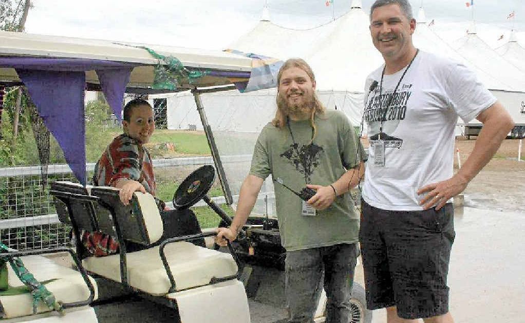 TEAM EFFORT: Volunteer Sam Grace (in buggy), manager of volunteers Matt Lyons and volunteer Jake Donohue. TEAM EFFORT: Volunteer Sam Grace (in buggy), manager of volunteers Matt Lyons and volunteer Jake Donohue.