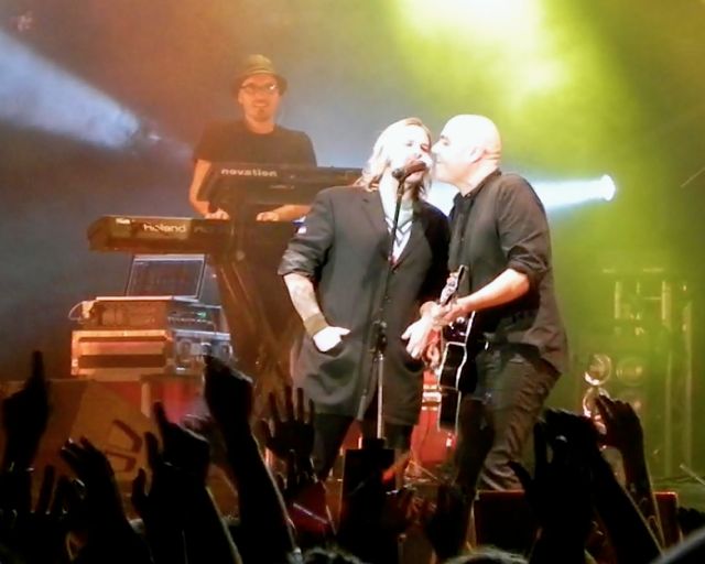 Kevin Max, lead singer of Audio Adrenaline, who used to be with the hit group dc Talk, joins Peter Furler on stage at Easterfest. Furler's former band Newsboys is now front by dc Talk's Michael Tait. Kevin Max, lead singer of Audio Adrenaline, who used to be with the hit group dc Talk, joins Peter Furler on stage at Easterfest. Furler's former band Newsboys is now front by dc Talk's Michael Tait.