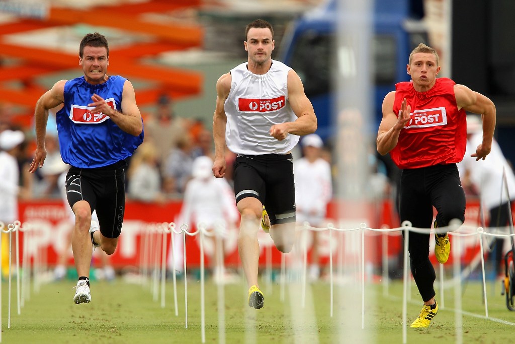 Andrew Robinson of Tasmania (blue) runs down the straight to cross the line and win the Australia Post Stawell Gift 120m Final during the 2013 Stawell Gift carnival at Central Park on April 1, 2013 in Stawell, Australia. Andrew Robinson of Tasmania (blue) runs down the straight to cross the line and win the Australia Post Stawell Gift 120m Final during the 2013 Stawell Gift carnival at Central Park on April 1, 2013 in Stawell, Australia.