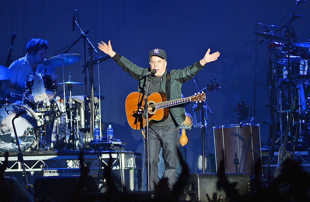 Paul Simon embraces the Bluesfest crowd. Paul Simon embraces the Bluesfest crowd.