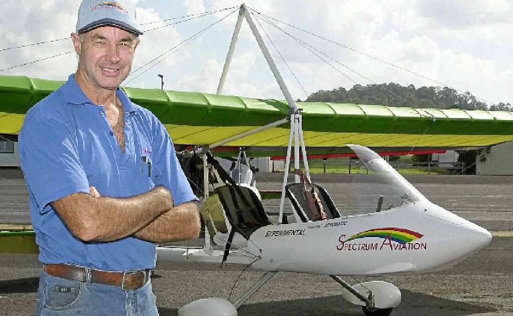 Wayne Fisher from Spectrum Aviation in front of one of his aircraft. Wayne Fisher from Spectrum Aviation in front of one of his aircraft.