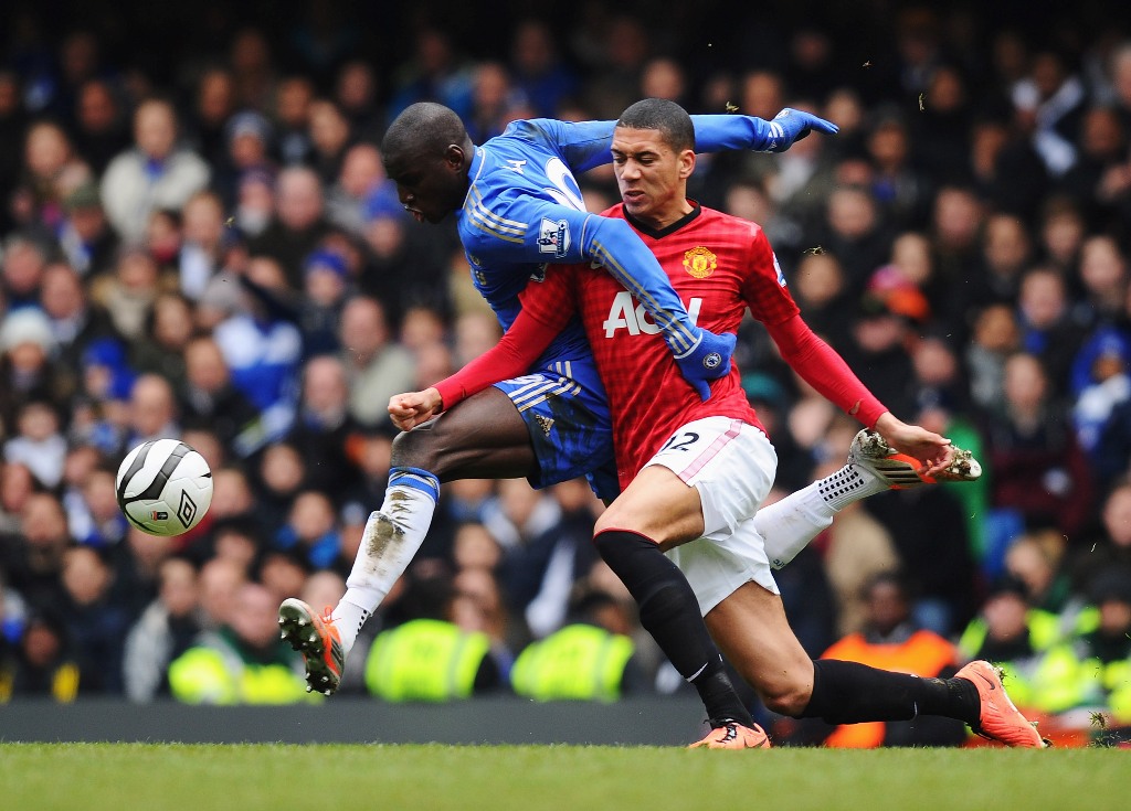 Chris Smalling of Manchester United challenges Demba Ba of Chelsea during the FA Cup with Budweiser Sixth Round Replay match between Chelsea and Manchester United at Stamford Bridge on April 1, 2013 in London, England. Chris Smalling of Manchester United challenges Demba Ba of Chelsea during the FA Cup with Budweiser Sixth Round Replay match between Chelsea and Manchester United at Stamford Bridge on April 1, 2013 in London, England.