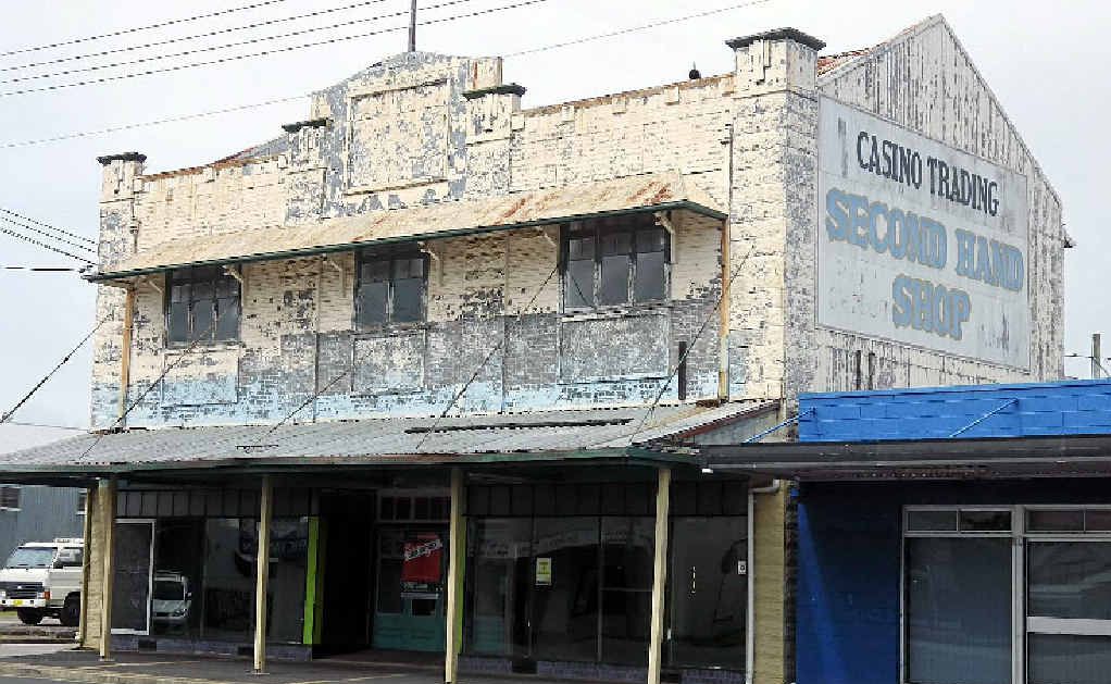 PETITION: A development application has been lodged with Richmond Valley Council to demolish the heritage-listed former Gray’s Garage building in Walker St, Casino. The building’s pressed metal facade is clearly visible. PETITION: A development application has been lodged with Richmond Valley Council to demolish the heritage-listed former Gray’s Garage building in Walker St, Casino. The building’s pressed metal facade is clearly visible.