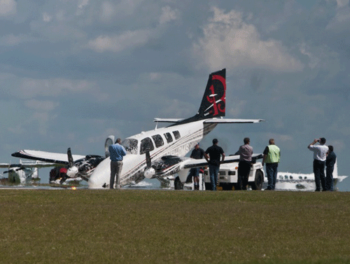 Two people on board this plane escaped without injury when its nose gear failed while landing at the Toowoomba Airport. Two people on board this plane escaped without injury when its nose gear failed while landing at the Toowoomba Airport.