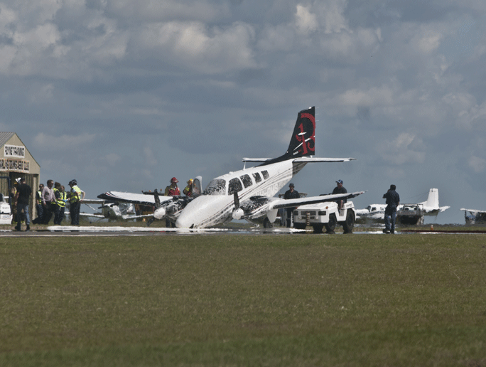 Emergency services respond to an incident at the Toowoomba Airport where a plane's nose gear failed to lock into place on landing. Emergency services respond to an incident at the Toowoomba Airport where a plane's nose gear failed to lock into place on landing.