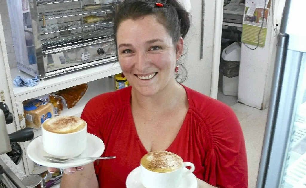 Grafton Base Hospital shop owner Marie Howe is excited to trial the suspended coffee idea. She will throw in five cups to start the ball rolling. Photo: Tim Howard Grafton Base Hospital shop owner Marie Howe is excited to trial the suspended coffee idea. She will throw in five cups to start the ball rolling. Photo: Tim Howard