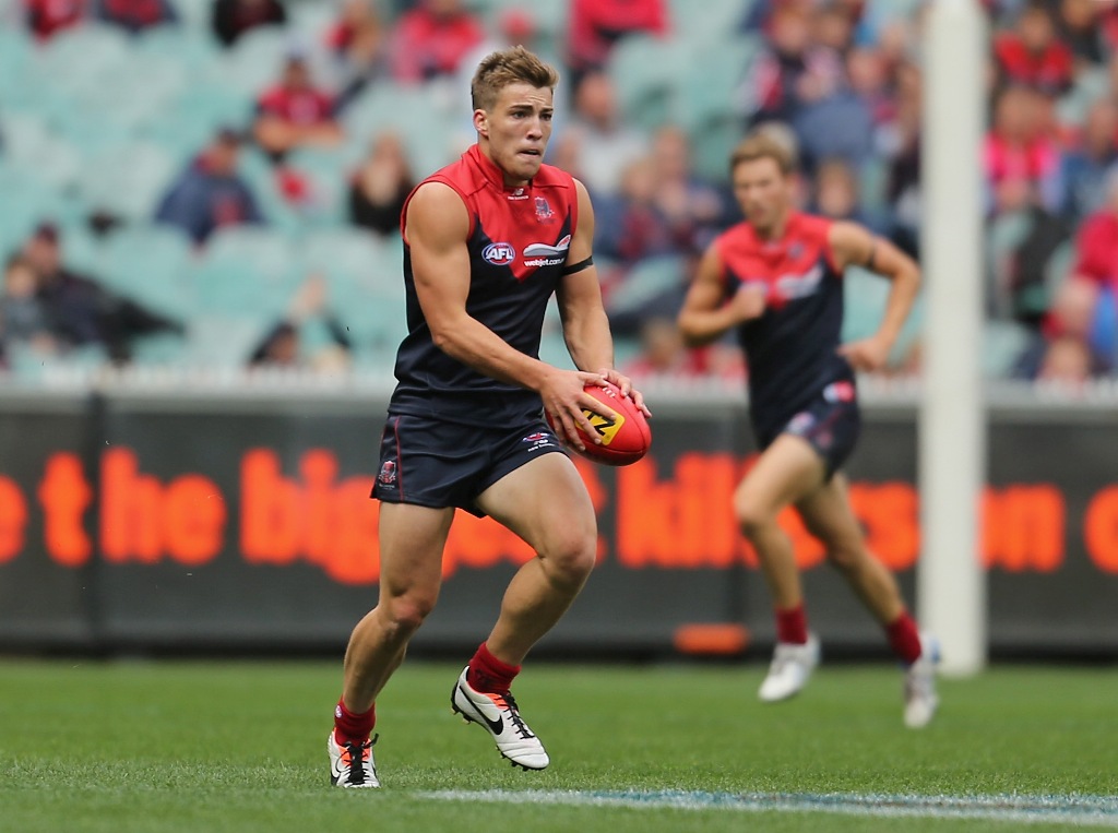 Jack Viney of the Demons runs with the ball during the round one AFL match between the Melbourne Demons and Port Adelaide Power at the Melbourne Cricket Ground on March 31, 2013 in Melbourne, Australia. Jack Viney of the Demons runs with the ball during the round one AFL match between the Melbourne Demons and Port Adelaide Power at the Melbourne Cricket Ground on March 31, 2013 in Melbourne, Australia.