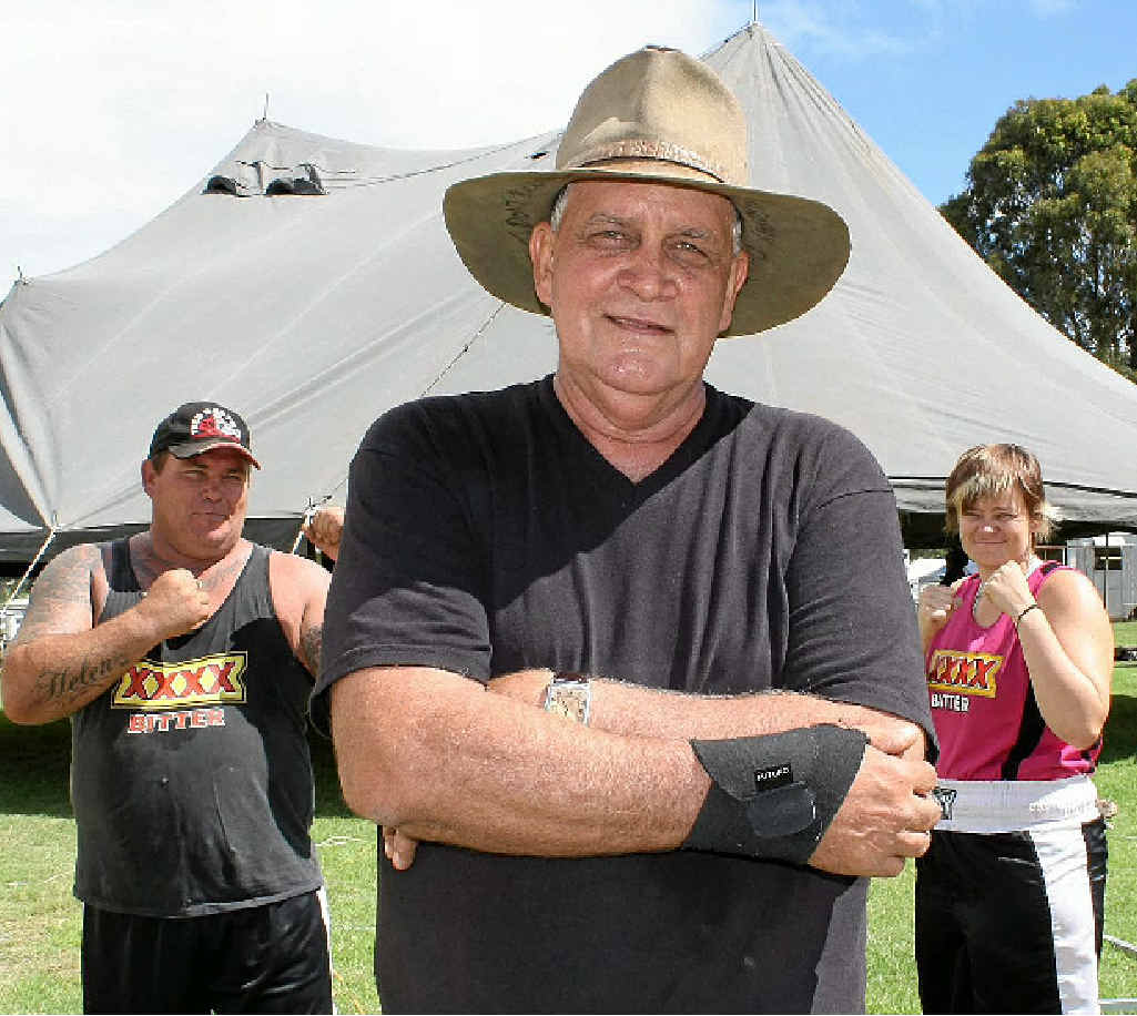 Fred Brophy (middle) with members of his boxing troupe Butterbean and The Beaver, who are preparing to fight at the Warwick Show tomorrow night. Fred Brophy (middle) with members of his boxing troupe Butterbean and The Beaver, who are preparing to fight at the Warwick Show tomorrow night.