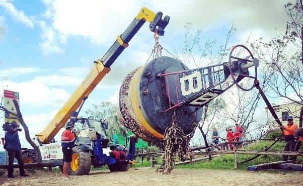 Instagram user @jake_mckellar snapped Clayton's Towing craning a washed up buoy off Peregian Beach. Instagram user @jake_mckellar snapped Clayton's Towing craning a washed up buoy off Peregian Beach.