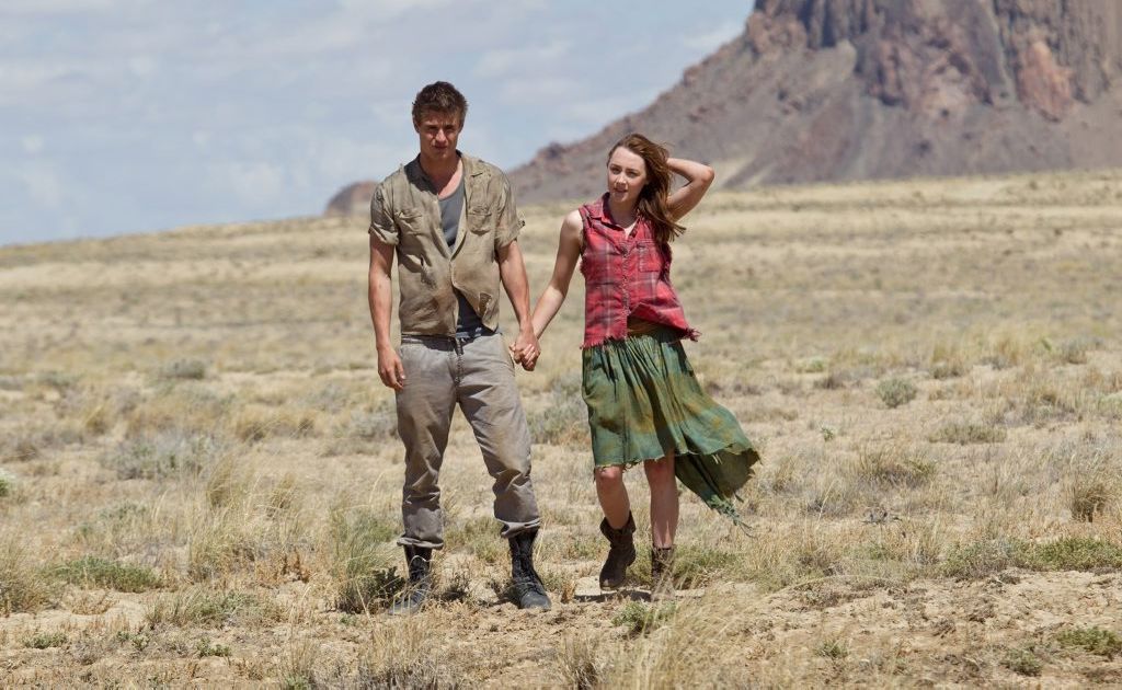 Max Irons and Saoirse Ronan in a scene from the movie The Host. Max Irons and Saoirse Ronan in a scene from the movie The Host.