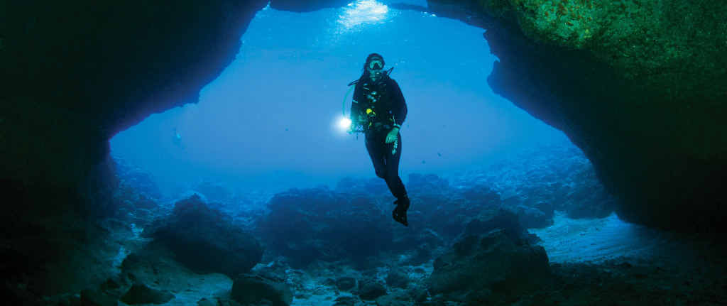 DIVE IN: A scuba diver explores Thundercliff Cave at Christmas Island. DIVE IN: A scuba diver explores Thundercliff Cave at Christmas Island.