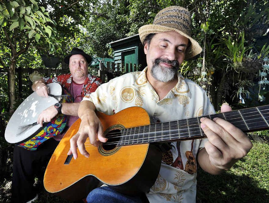 TUNED IN: Darryl Humphries and David Peacock (right) warm up for the International Cafe World Music event that will be held at the Masonic Hall in Ipswich on Saturday.