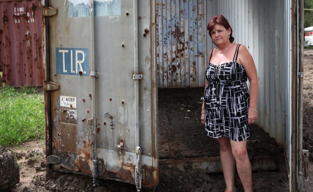 Judy Stricklan had her belongings stored in containers that were flooded in the January flash floods. Photo Allan Reinikka / The Morning Bulletin Judy Stricklan had her belongings stored in containers that were flooded in the January flash floods. Photo Allan Reinikka / The Morning Bulletin