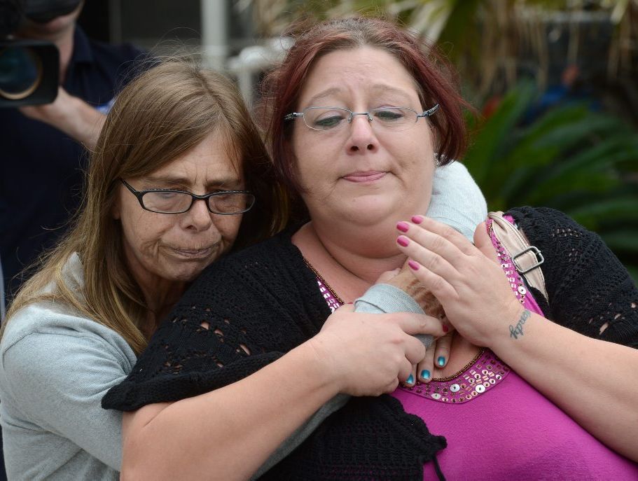 Debbie Sneddon (left), close friend of murdered nurse Wendy Evans, hugs Michelle Tuifufu (right), sister of Wendy Evans as they leave the Toowoomba courthouse. Debbie Sneddon (left), close friend of murdered nurse Wendy Evans, hugs Michelle Tuifufu (right), sister of Wendy Evans as they leave the Toowoomba courthouse.