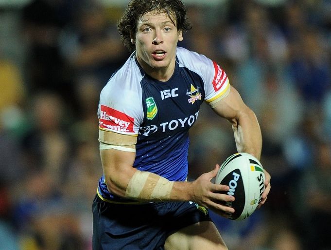 Rory Kostjasyn of the Cowboys runs the ball in attack during the round five NRL match between the North Queensland Cowboys and the Penrith Panthers at 1300SMILES Stadium on April 6, 2013 in Townsville, Australia. Rory Kostjasyn of the Cowboys runs the ball in attack during the round five NRL match between the North Queensland Cowboys and the Penrith Panthers at 1300SMILES Stadium on April 6, 2013 in Townsville, Australia.