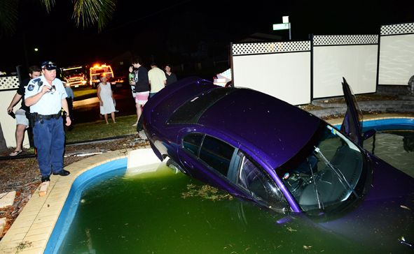 CAR WASH: A driver crashed his car through a fence and into a pool on the corner of Tudor and Challinor Street in West Ipswich. CAR WASH: A driver crashed his car through a fence and into a pool on the corner of Tudor and Challinor Street in West Ipswich.