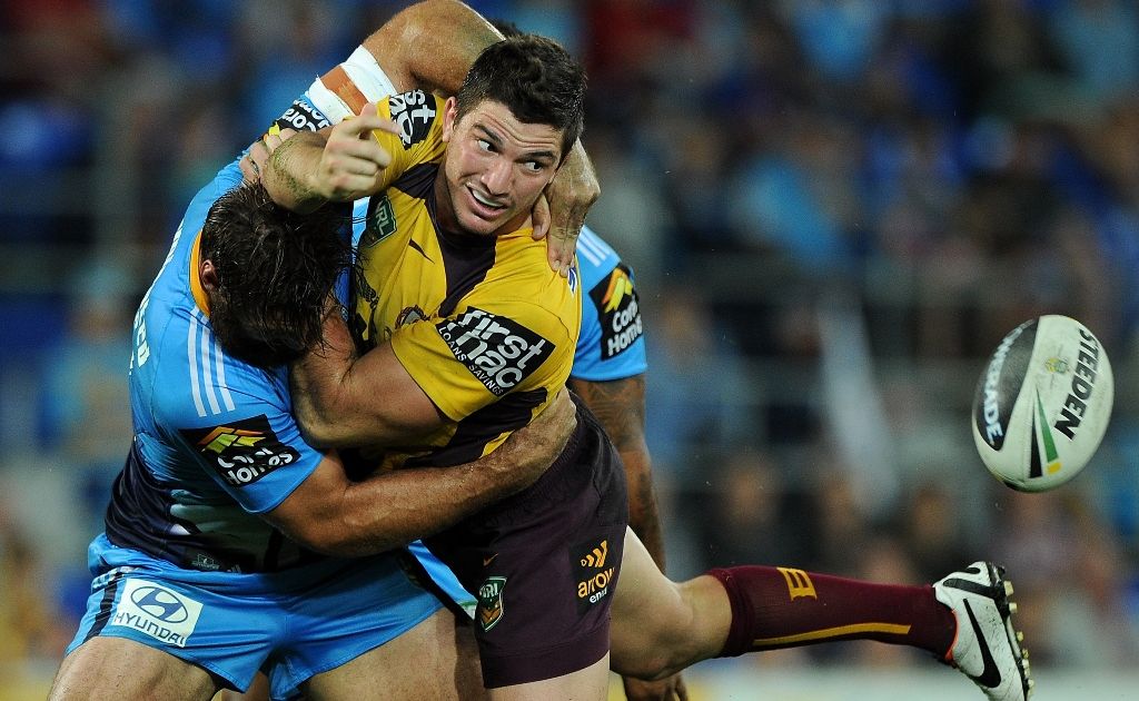 Matt Gillett of the Broncos offloads in the tackle during the round five NRL match between the Gold Coast Titans and the Brisbane Broncos at Skilled Park on April 5, 2013 on the Gold Coast, Australia. Matt Gillett of the Broncos offloads in the tackle during the round five NRL match between the Gold Coast Titans and the Brisbane Broncos at Skilled Park on April 5, 2013 on the Gold Coast, Australia.