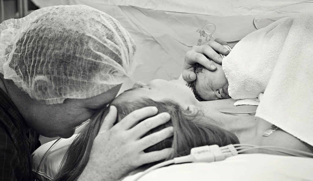 PRECIOUS MOMENT: Steve Burnett cuddles his wife Katie as they welcome Josie into the world. PRECIOUS MOMENT: Steve Burnett cuddles his wife Katie as they welcome Josie into the world.