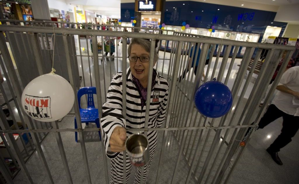 Lismore Mayor Jenny Dowell is locked up in Lismore Square as part of the PCYC fund raiser. Lismore Mayor Jenny Dowell is locked up in Lismore Square as part of the PCYC fund raiser.