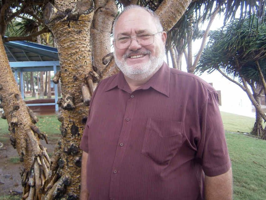 De-amalgamation transition manager Graeme Kanofski looks over Yeppoon before settling into sharing out the assets and debt of Rockhampton and Livingstone councils.