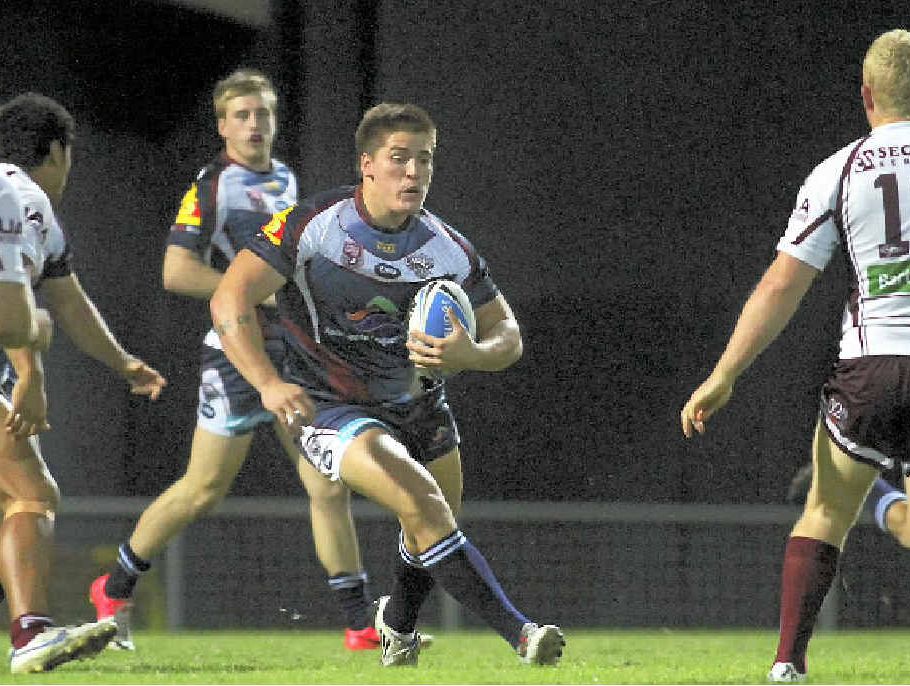 Capras' Arlin Paki looks for space against Burleigh Bears at Browne Park, Rockhampton.