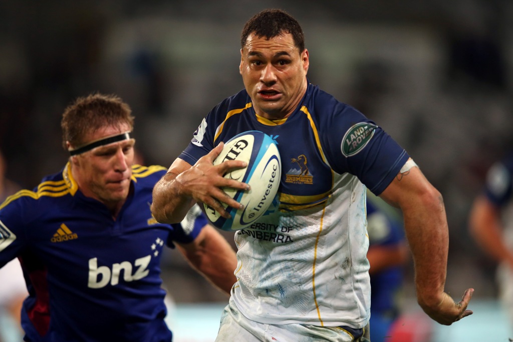 George Smith of the Brumbies runs past Brad Thorn of the Highlanders during the round nine Super Rugby match between the Highlanders and the Brumbies at the Forsyth Barr Stadium on April 12, 2013 in Dunedin, New Zealand. George Smith of the Brumbies runs past Brad Thorn of the Highlanders during the round nine Super Rugby match between the Highlanders and the Brumbies at the Forsyth Barr Stadium on April 12, 2013 in Dunedin, New Zealand.