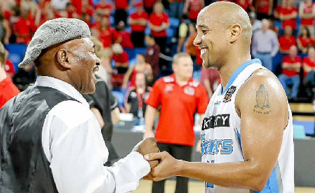 NBL legend Cal Bruton congratules his son, CJ. NBL legend Cal Bruton congratules his son, CJ.